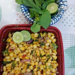 A picture of Spicy Corn Chaat 🧅🌽.