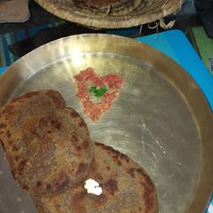 A picture of Carrot & Chestnut flour Paratha.