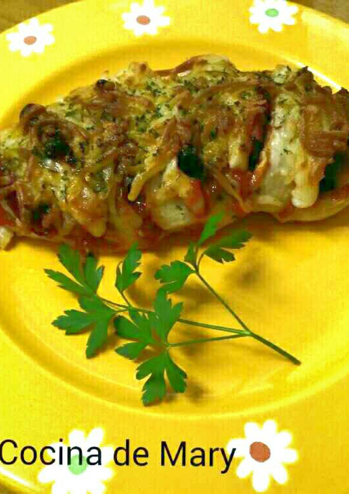 Una foto de Pechuga de pollo rellena