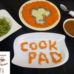 White and orange rice (cookpad logo) A picture of White and orange rice (cookpad logo).
