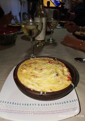 Una foto de Chupé de Mariscos al disco gratinado al Parmesano