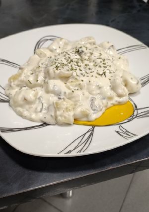 Una foto de Gnocchi con setas y salsa de queso