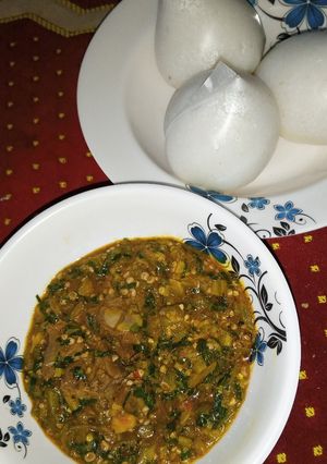 A picture of Tuwan shinkafa with okro soup.