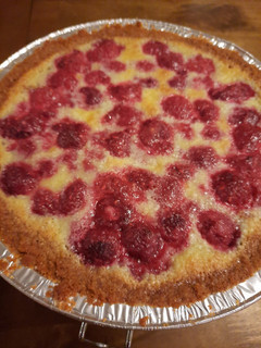 A picture of (Rasp)berry custard tart in a cookie crumb crust.