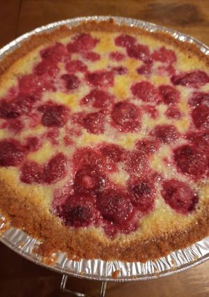 A picture of (Rasp)berry custard tart in a cookie crumb crust.