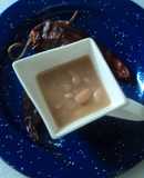 Frijoles al pulque tipo rancho Chiqueros y chiles dorados en asiento de carnitas