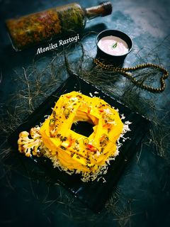 लेेेेयर्ड खांडवी स्टफ्ड विद गोबी फ्राइस (Layered Khandvi Stuffed with Gobhi Fries recipe in Hindi) रेसिपी मुख्य फोटो