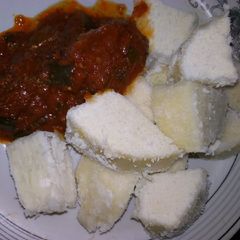 A picture of White yam and stew.