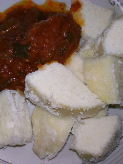 A picture of White yam and stew.