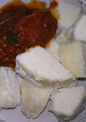 A picture of White yam and stew.