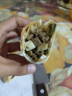 Una foto de Empanadas de carne cortada a cuchillo 😲
