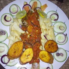 A picture of Lemon tilapia source wit potatoes.