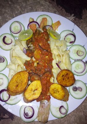 A picture of Lemon tilapia source wit potatoes.
