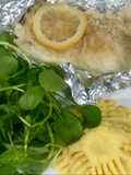 Merluza austral con polenta y berros