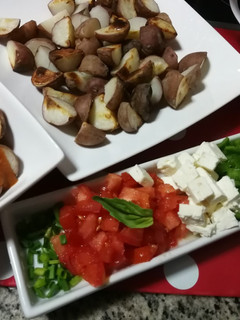 Una foto de Papas en salsa brava con picadillo 🌱vegetariana