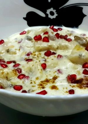 A picture of Pineapple and mixed fruit raita.