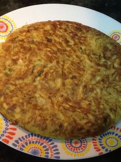 Una foto de Tortilla de pimientos verdes y berenjena con queso