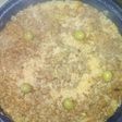 Paella de carne al vino tinto