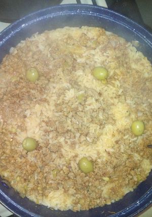 Una foto de Paella de carne al vino tinto