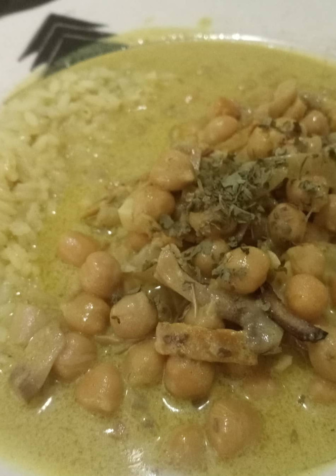 Una foto de Curry de garbanzos (🌱) vegano