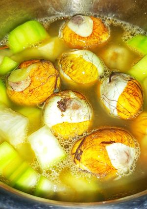 Hình của món Bầu um hột vịt lộn.