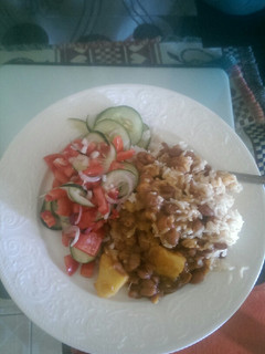 A picture of Rice, beans and salad.