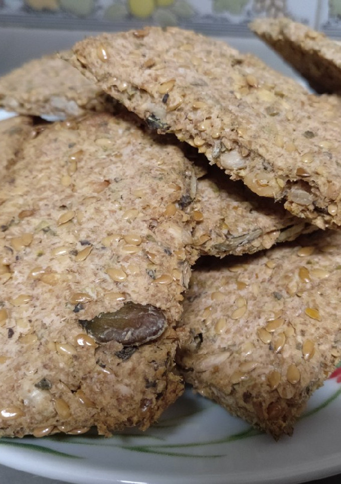 Una foto de Crackers mix de semillas y orégano