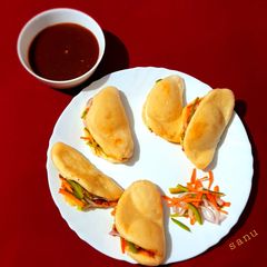A picture of Noodles Bao Bun With Sweet and Sour Sauce.