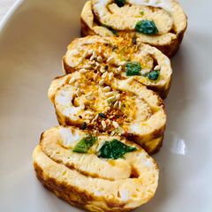 A picture of Tamagoyaki in a round pan - Parchment Paper Trick!.