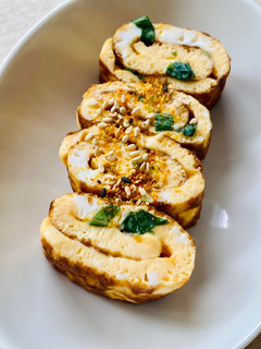A picture of Tamagoyaki in a round pan - Parchment Paper Trick!.
