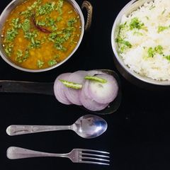 A picture of Raw Mango Dal with Rice.