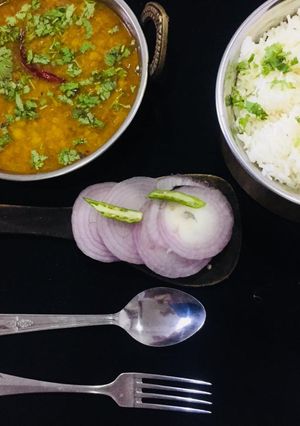 A picture of Raw Mango Dal with Rice.