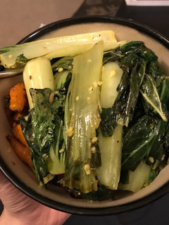 A picture of Bok choy & carrots with wild rice.