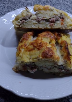 Una foto de Arrollado de papa y carne de Bigote cocina