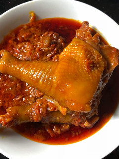 A picture of Palm oil chicken stew.