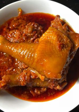 A picture of Palm oil chicken stew.