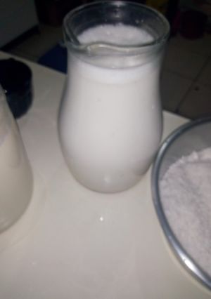 Una foto de Leche, aceite y coco rallado