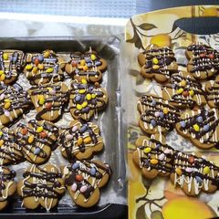 Simple biscuits with toping of chocolate and bunties A picture of Simple biscuits with toping of chocolate and bunties.