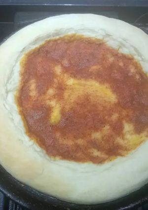 Una foto de Pizza al molde