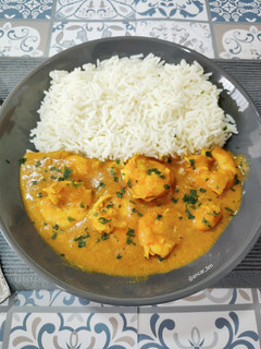 Una foto de Curry de langostinos