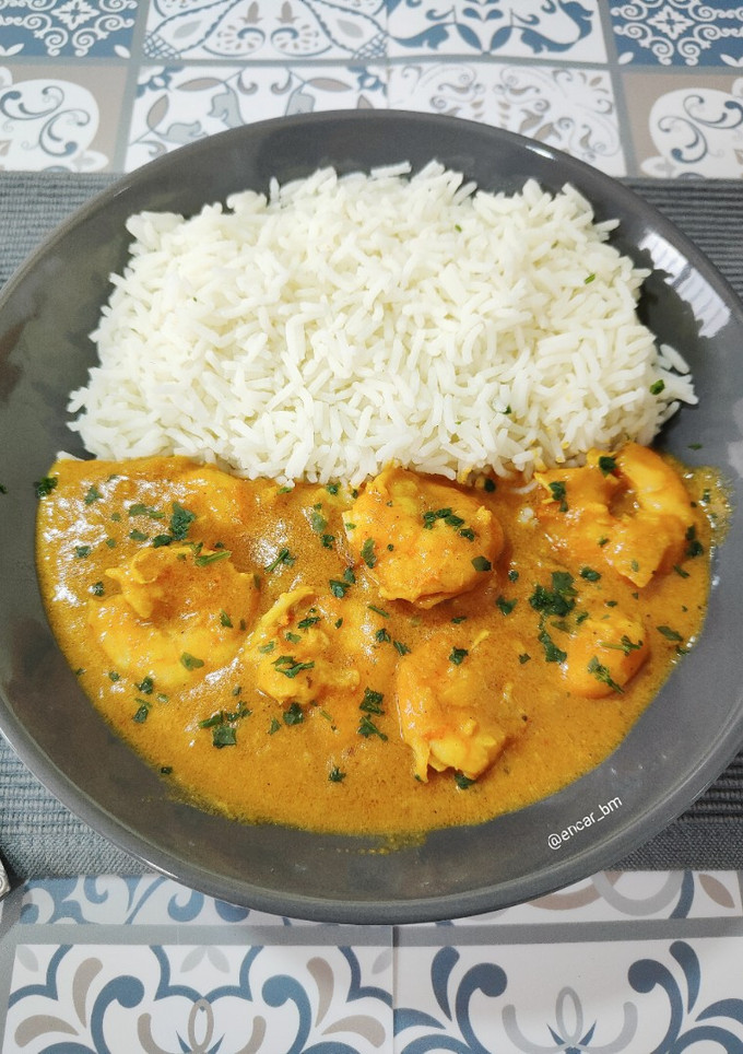 Una foto de Curry de langostinos