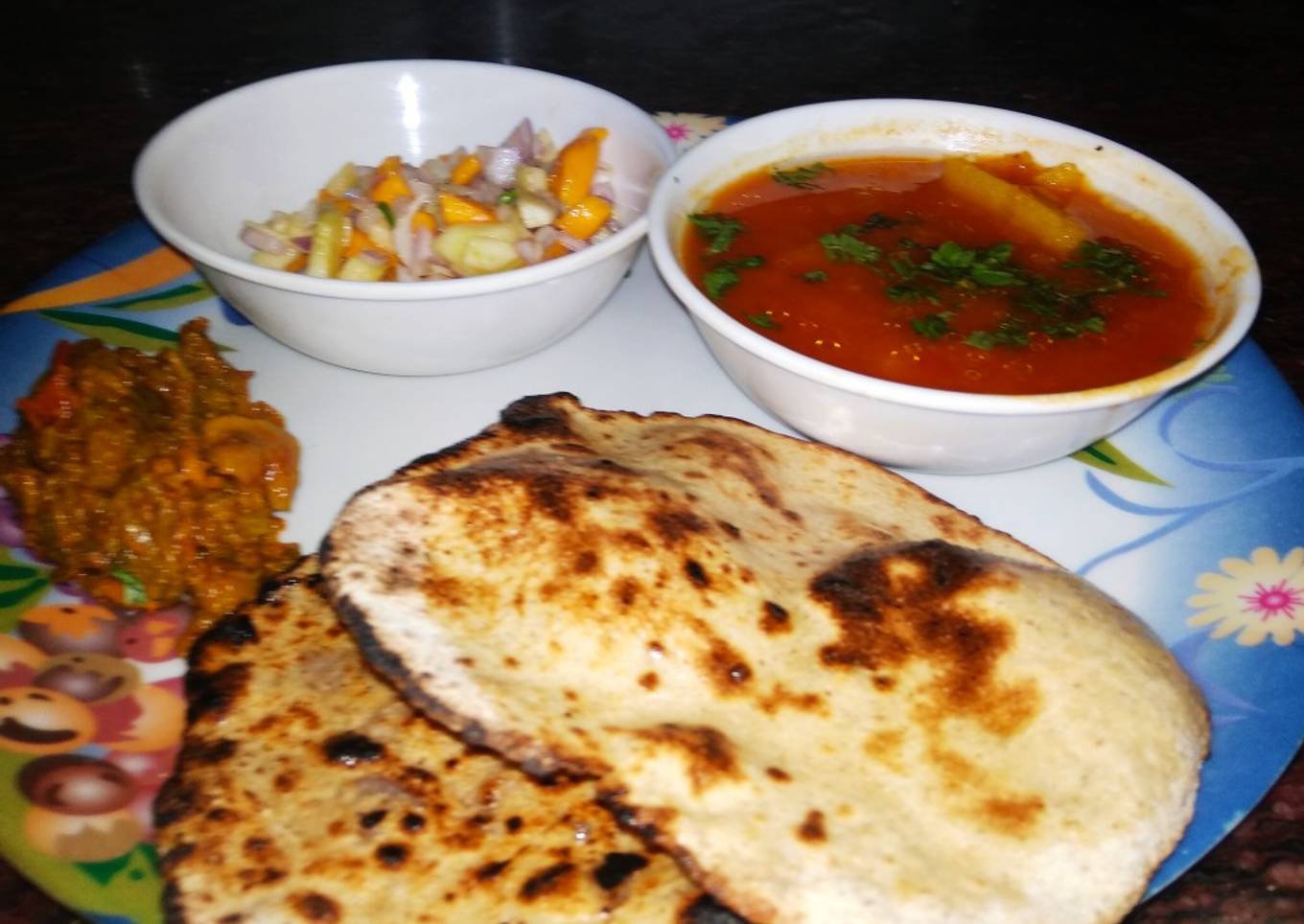 Lauki Roti(tandoori) with aloo tamatar, karela and salad