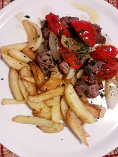 Una foto de Lomo Saltado