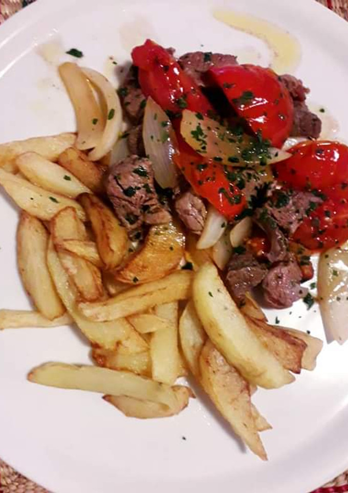 Una foto de Lomo Saltado