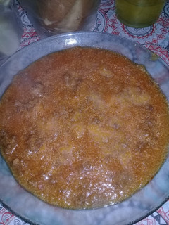 Una foto de Polenta con tuco