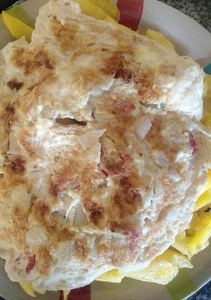 A picture of Chips and egg for breakfast.