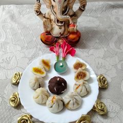 A picture of Handmade traditional modak-dipped in chocolate.