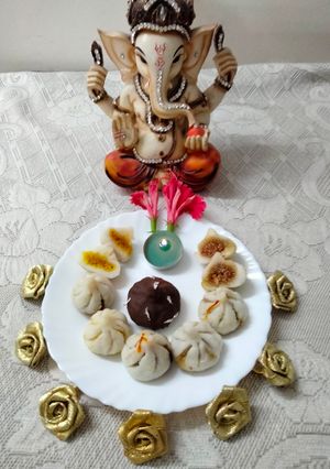 A picture of Handmade traditional modak-dipped in chocolate.