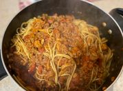 A picture of spaghetti with tomato sauce