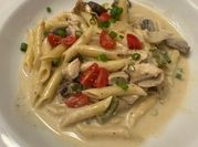 A picture of green onion alfredo